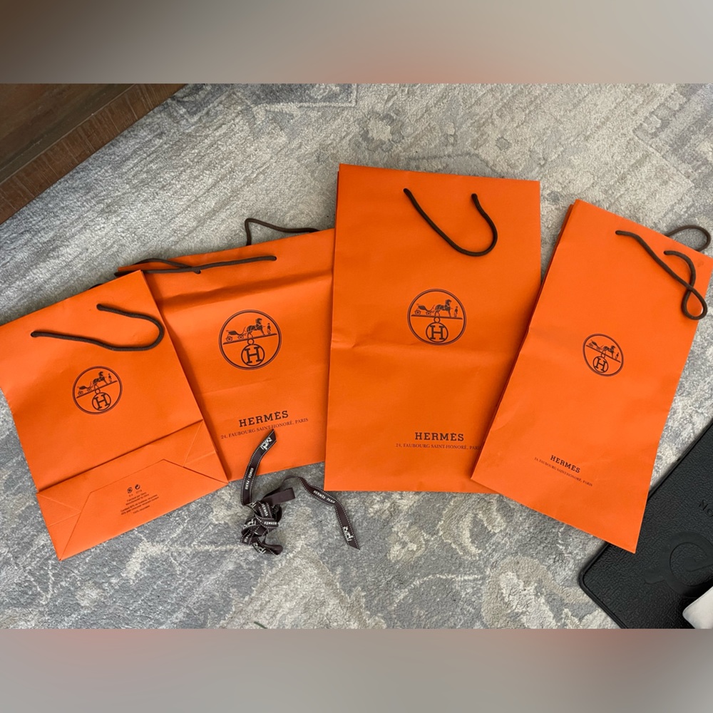 Lot of Hermes bags and ribbon